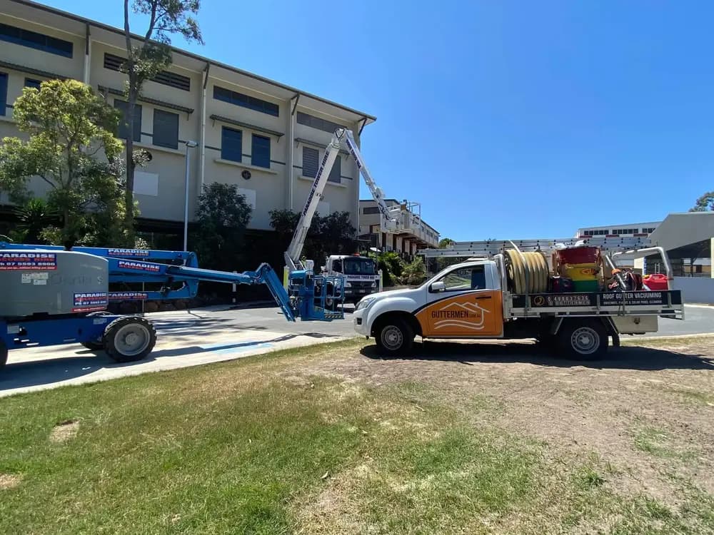The Guttermen crew on a Gold Coast job with elevated work-access equipment.